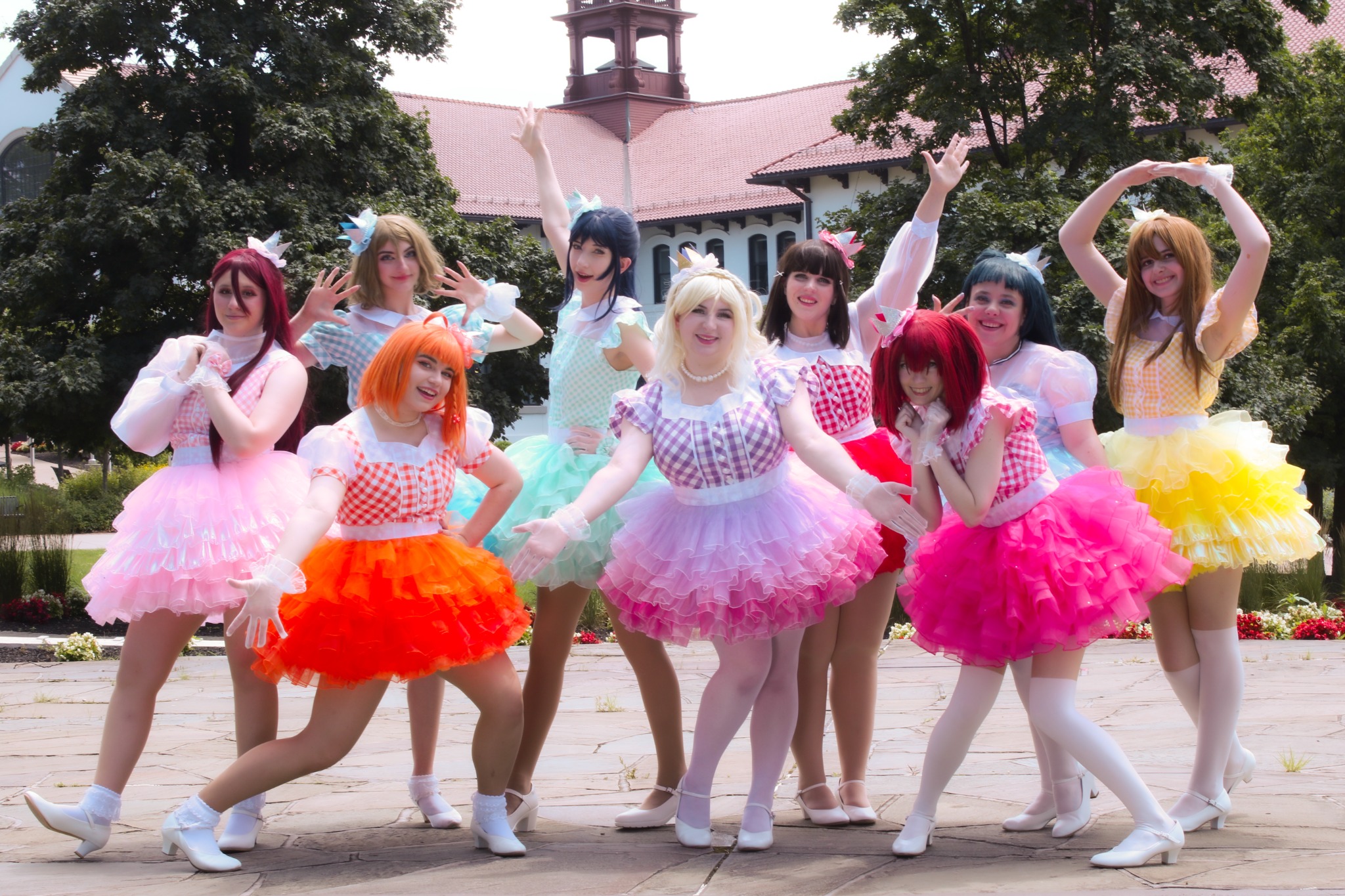 The Sweetheart Collective performers in colorful idol costumes